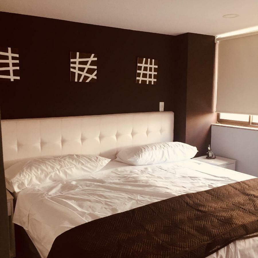 Hotel Garden City Boutique Фусагасуга Екстериор снимка